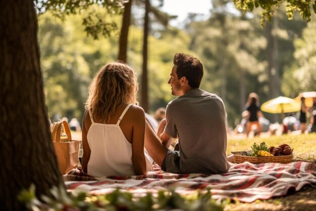 A photo of a couple having a picnic in a scenic park